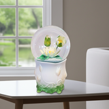 Decorative lamp with floral design on a table near a window