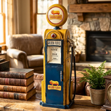 Vintage Golden Fleece gas pump on a wooden table with a cozy living room background.