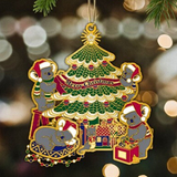 Decorative Christmas ornament with koalas around a Christmas tree on a blurred Christmas tree background.