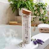 Sleep Soak product in a bathroom setting with plants and a bathtub.