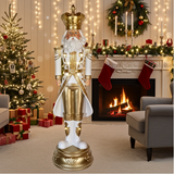 Decorative nutcracker figure in a festive living room with Christmas tree and fireplace.