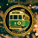 Decorative ornament of a tram with 'Melbourne' text, hanging on a tree.