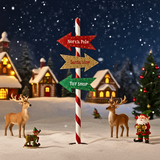 Decorative Christmas signpost with Santa's Village background