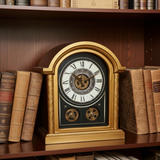 Decorative clock with gears on a wooden shelf with books
