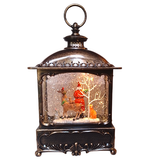 Decorative lantern with a reindeer and Santa Claus scene inside on a white background