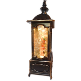 Decorative lantern with glowing interior on a white background