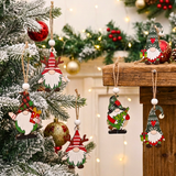 Christmas gnome ornaments on a decorated tree with lights and ornaments.